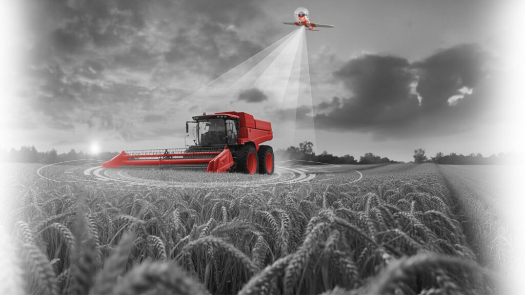 Modern combine harvester in a wheat field